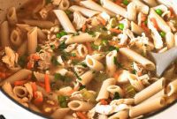 Hearty Dutch Oven Chicken Noodle Soup with Tender Thighs