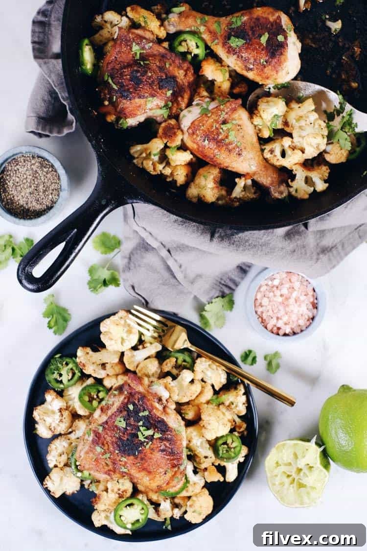 Crispy chicken thighs with zesty cauliflower are the perfect Paleo + Whole30 + Keto spicy meal. Packed with flavor, including citrus, cilantro and jalapeño!