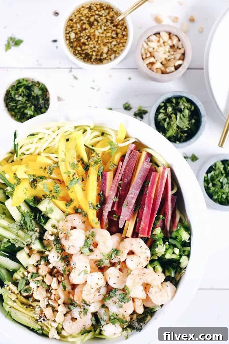 Our Shrimp Zoodle Spring Roll Bowl is loaded with an incredible array of fresh veggies and aromatic herbs, creating a texture and flavor explosion. Paleo, Whole30, Gluten-Free, Soy-Free, and Dairy-Free perfection.