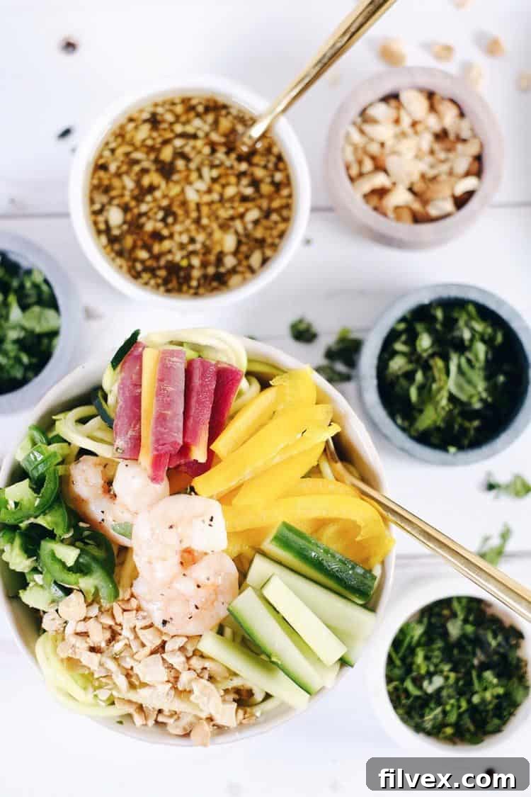 The savory and refreshing dressing is a key component of this Shrimp Zoodle Spring Roll Bowl, featuring garlic, coconut aminos, and lime juice for a perfectly balanced flavor profile. Paleo, Whole30, Gluten-Free, Soy-Free, Dairy-Free.