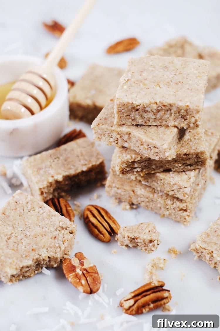 Delicious no-bake honey nut bars ready for a healthy snack or dessert. Paleo, Gluten-Free, Refined Sugar-Free, and easy to make.