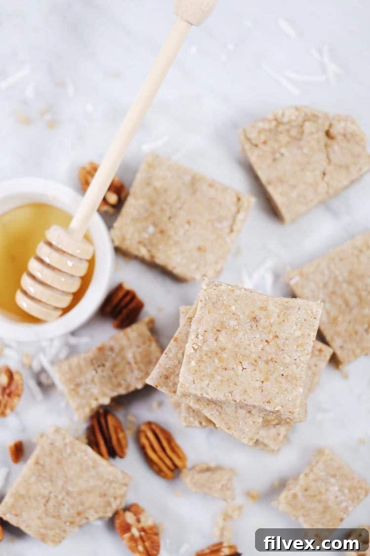 A mix of nuts and seeds for no-bake honey nut bars in a bowl, highlighting ingredient flexibility and healthy fats.