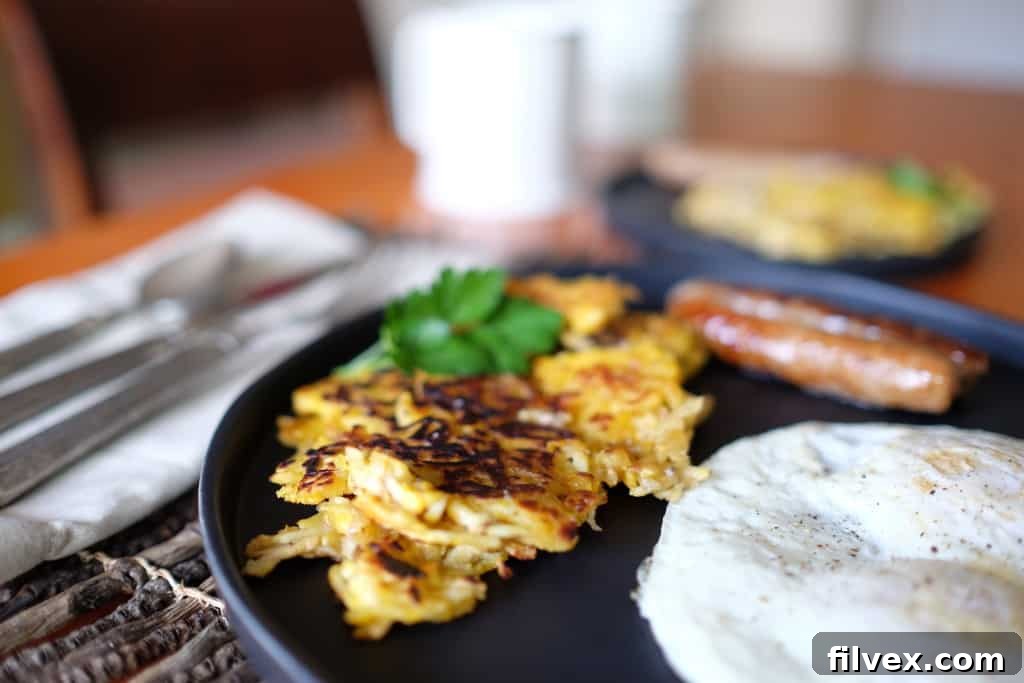 Paleo hash browns served with eggs and sausage