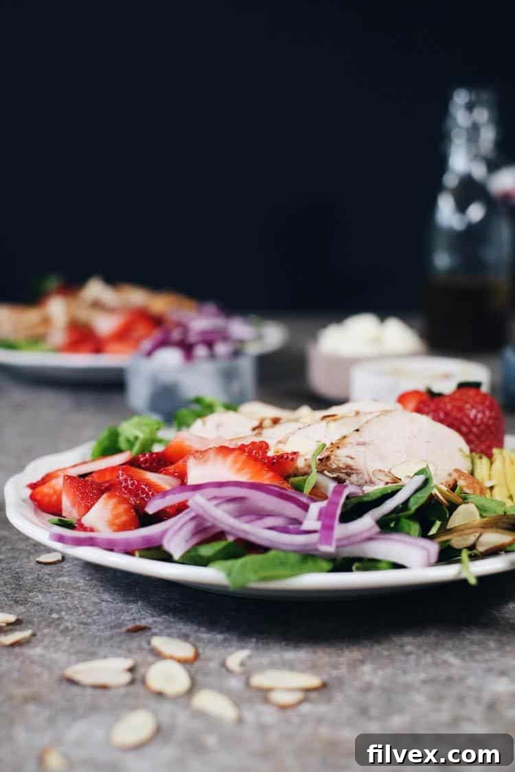 Close-up shot of the simple yet flavorful homemade balsamic dressing, featuring olive oil, balsamic vinegar, and Dijon mustard, ready to be drizzled over fresh salad ingredients.