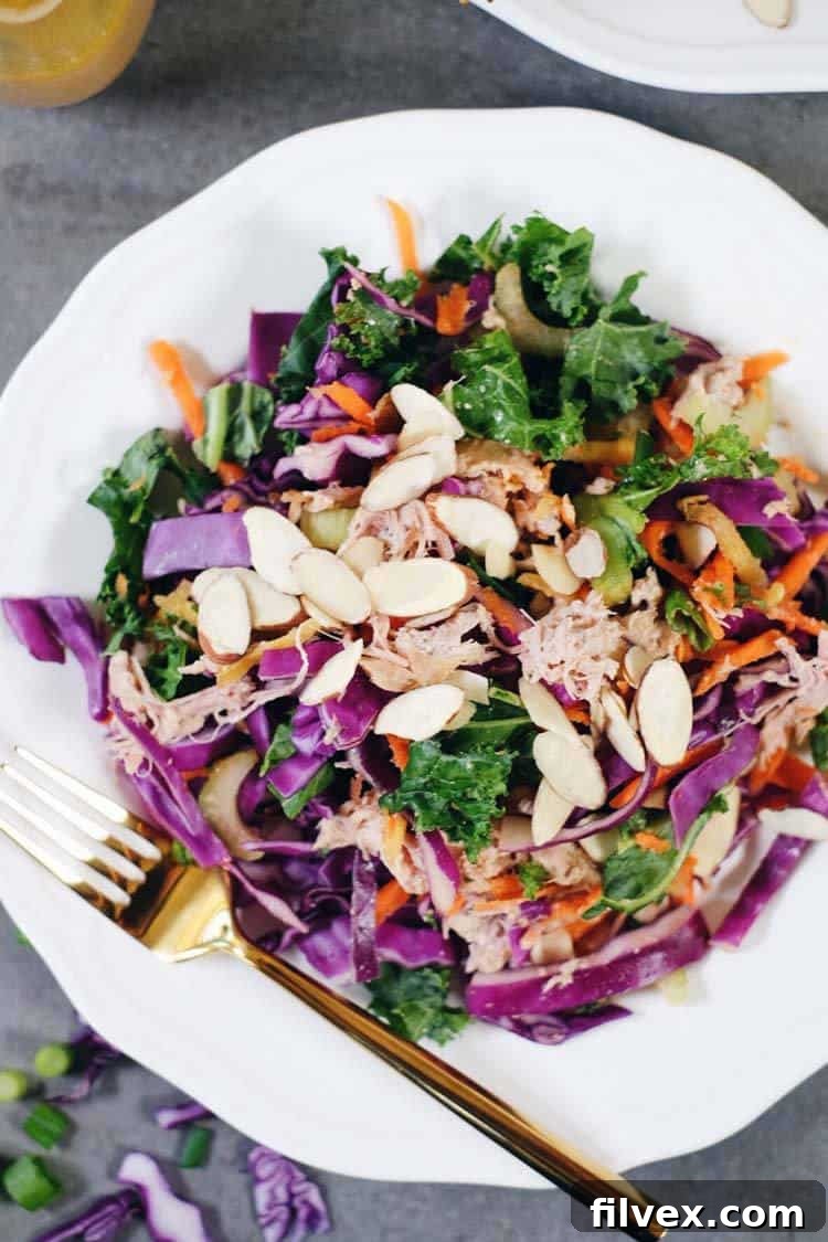 One of my favorite salads to make ahead of time and enjoy the leftovers for lunch is this Whole30 and Paleo Chinese chicken salad. It's packed with colorful veggies (cabbage, carrots, kale, onions and celery) plus easy shredded chicken and a simple dressing. Paleo + Whole30 | realsimplegood.com