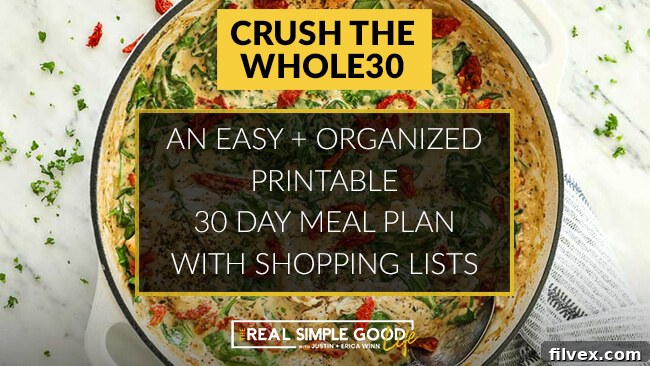 Creamy tuscan chicken in skillet with 'crush the whole30, an easy + organized printable 30 day meal plan with shopping lists' text overlay