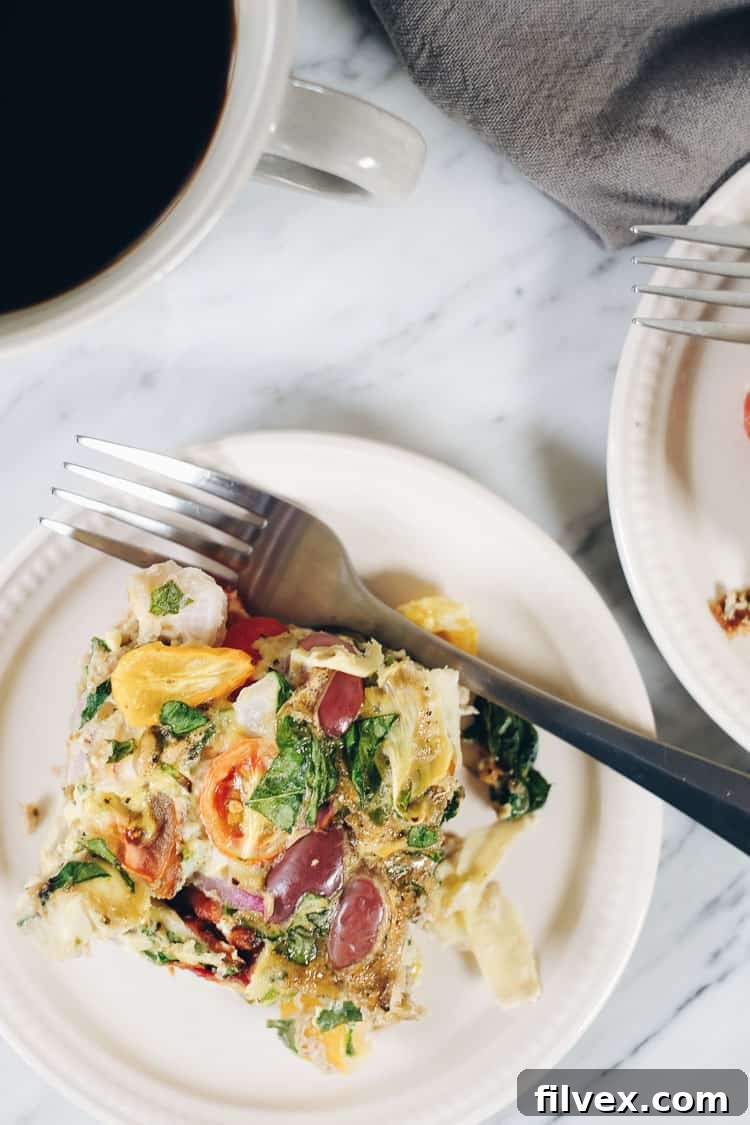 This Paleo and Whole30 Mediterranean breakfast frittata is a great make ahead breakfast you can re-heat in the morning for a start to the day! Paleo, Whole30 and Dairy-Optional | realsimplegood.com