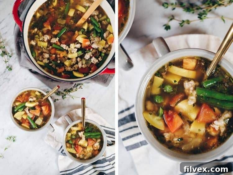 Close-up of a vibrant bowl of Turkey and Summer Vegetable Soup, garnished with fresh herbs, showcasing colorful vegetables and lean ground turkey.