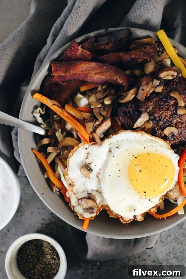 Quick and easy Chipotle Beef Paleo Burger Bowls, ready in 30 minutes. Cook in a cast iron skillet or on the grill for a healthy, spiced burger alternative. Paleo + Whole30 | realsimplegood.com