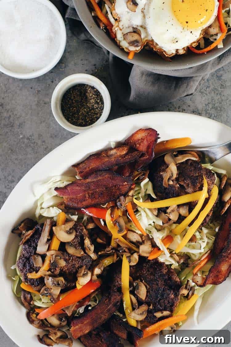 The ultimate finishing touch for your Chipotle Beef Paleo Burger Bowl: a perfectly cooked runny egg. Adds creaminess and richness to this healthy meal. Paleo + Whole30 | realsimplegood.com