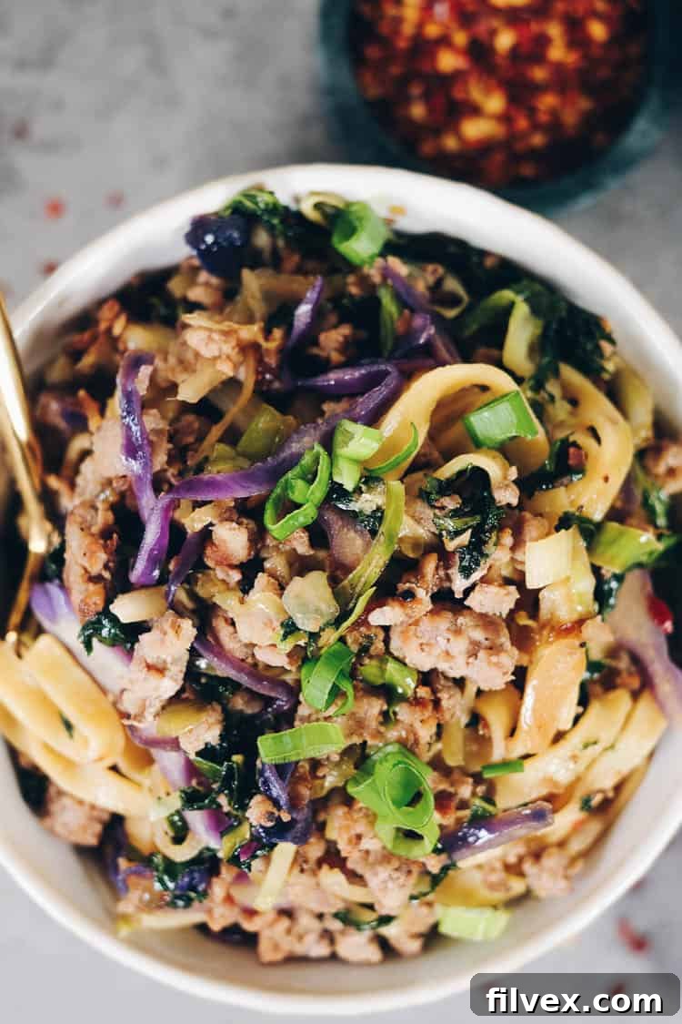 These Paleo potsticker noodle bowls are the BEST! Filled with cruciferous veggies, grain-free pasta and deliciously seasoned ground pork! Paleo, Gluten-Free, Dairy-Free + Soy-Free. | realsimplegood.com