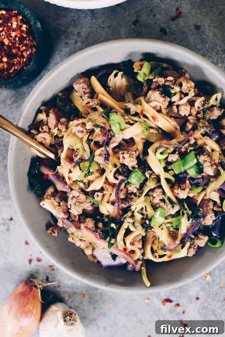 These Paleo potsticker noodle bowls are the BEST! Filled with cruciferous veggies, grain-free pasta and deliciously seasoned ground pork! Paleo, Gluten-Free, Dairy-Free + Soy-Free. | realsimplegood.com