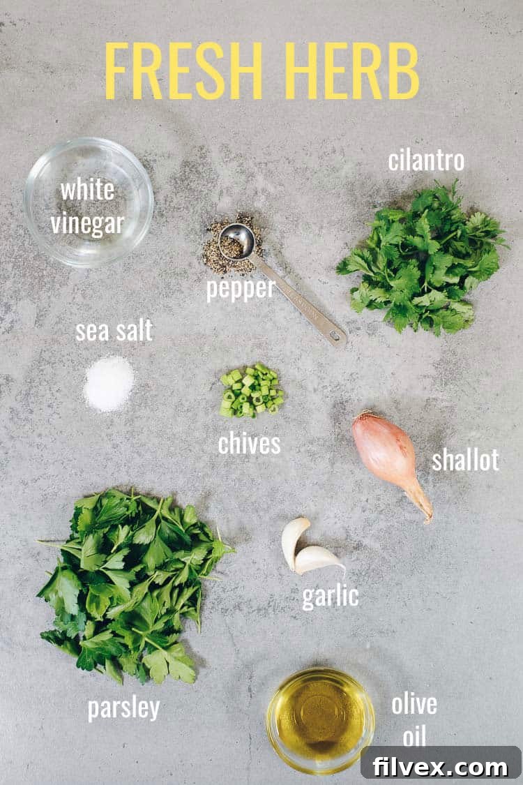 Fresh herb marinade ingredients laid out on gray background with text overlay by ingredients