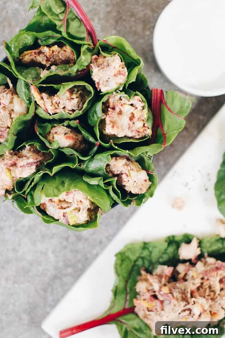 These Paleo and Whole30 pear and almond chicken salad wraps are perfect for packing along for a day trip or lunch during the busy week! | realsimplegood.com