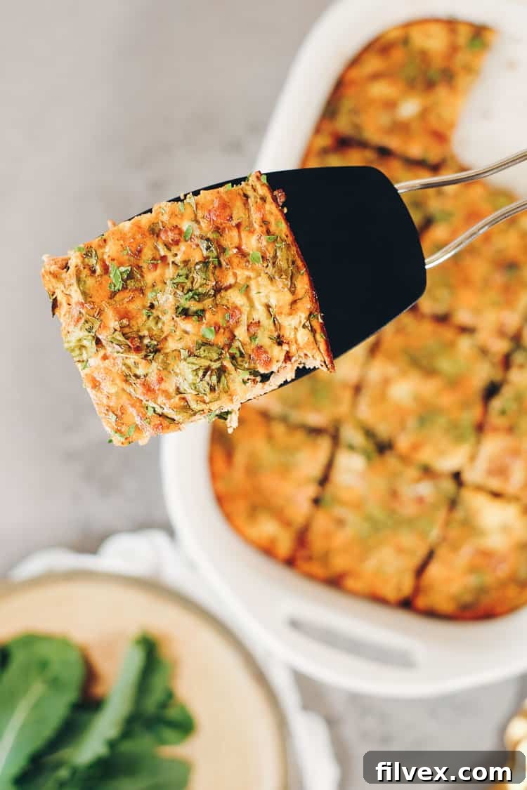 A generous portion of Paleo Breakfast Pizza Casserole, served in a dish, ready for enjoyment as a Whole30 and Keto breakfast.