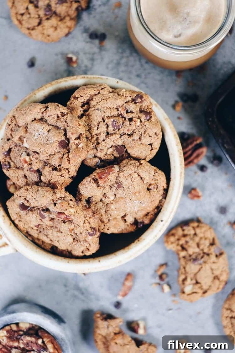 These Paleo chocolate chip pecan cookies are the perfect combo of salty and sweet, and easily a crowd pleaser! Gluten-Free + Dairy-Free. | realsimplegood.com