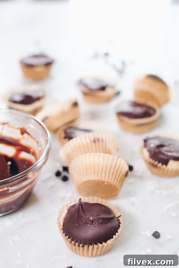 Homemade Paleo Coconut Butter Cups are an easy, clean, and satisfying no-bake dessert option for healthy eating.