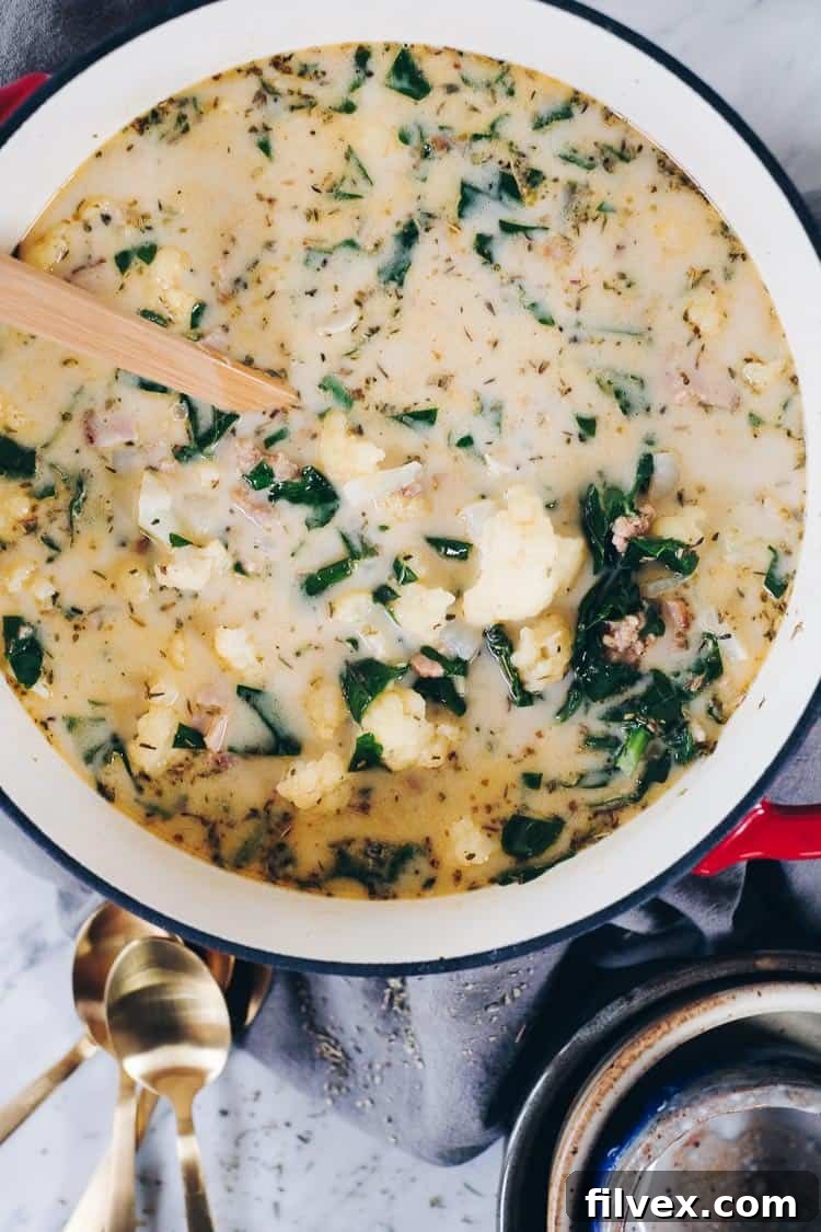There's something extra cozy about a big bowl of soup on a fall day. This Whole30 Zuppa Toscana is a great way to enjoy a creamy, dairy-free soup! Paleo, Whole30, Gluten-Free, Dairy-Free. | realsimplegood.com
