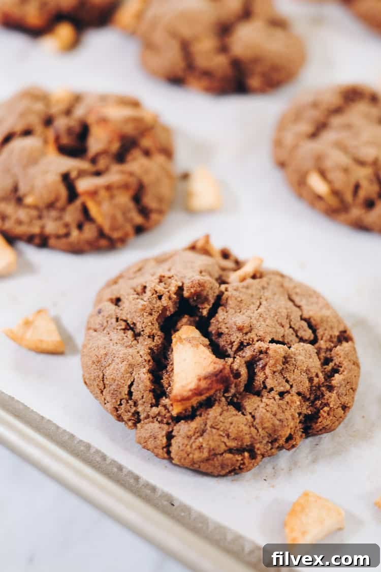 Generous cinnamon makes these Paleo Apple Cinnamon Cookies incredibly flavorful and comforting. Naturally gluten-free, dairy-free, and refined sugar-free. | realsimplegood.com