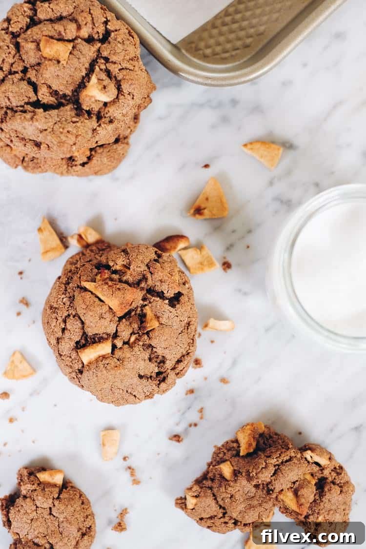 Creative ways to enjoy Paleo Apple Cinnamon Cookies, including crumbling over dairy-free vanilla ice cream with a drizzle of cinnamon maca almond butter. | realsimplegood.com