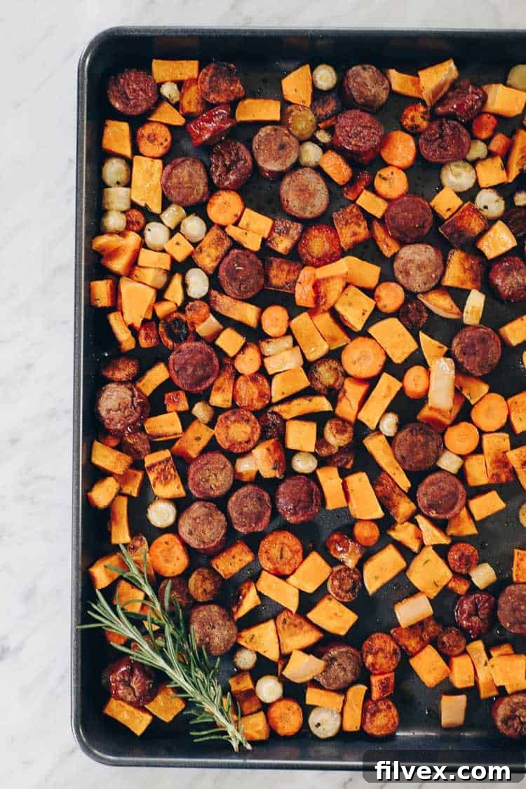 Easy Sheet Pan Roasted Sausage and Vegetables featuring colorful roasted root vegetables and savory sausage, perfect for a quick and healthy egg-free dinner.