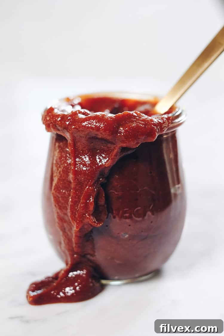 This Instant Pot Whole30 Pulled Pork with BBQ Sauce is the perfect way to utilize your Instant Pot! Also, we made the yummiest Whole30 friendly BBQ Sauce! | realsimplegood.com