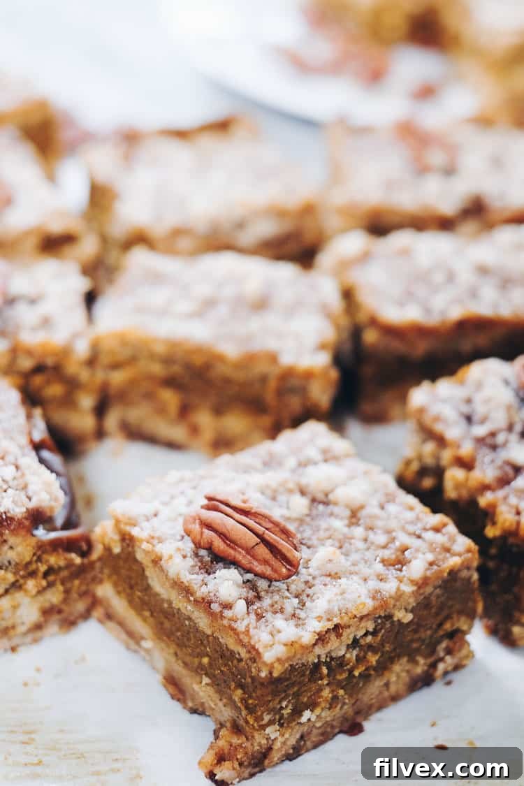 These delicious Paleo pumpkin bars are filled with all the fall flavors you're craving without dairy, gluten, eggs or refined sugar! | realsimplegood.com