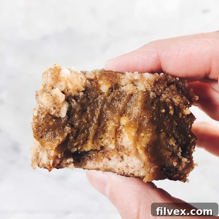 These delicious Paleo pumpkin bars are filled with all the fall flavors you're craving without dairy, gluten, eggs or refined sugar! | realsimplegood.com
