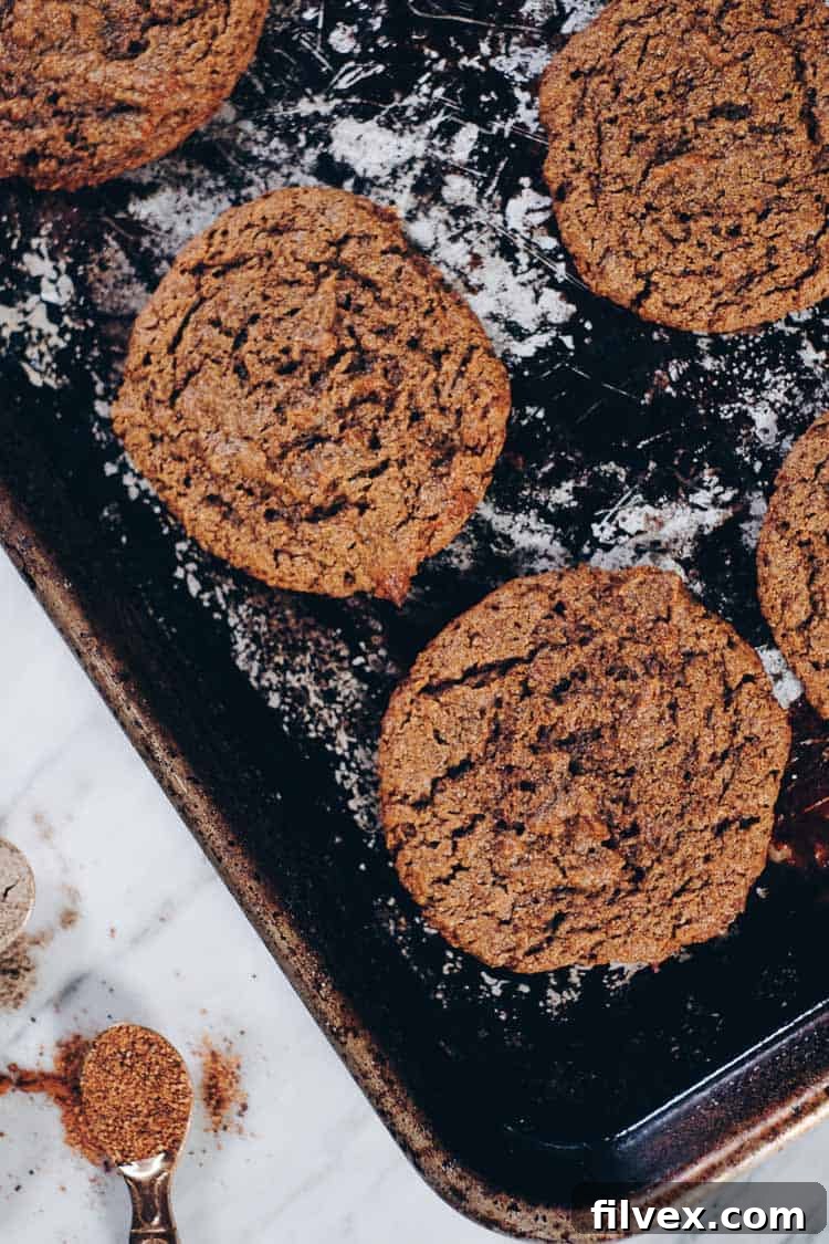 Paleo Chai Spiced Cookies arranged artfully, quick and easy to whip up and making any house smell cozy. Gluten-Free, Dairy-Free, Egg-Free, Refined Sugar-Free.