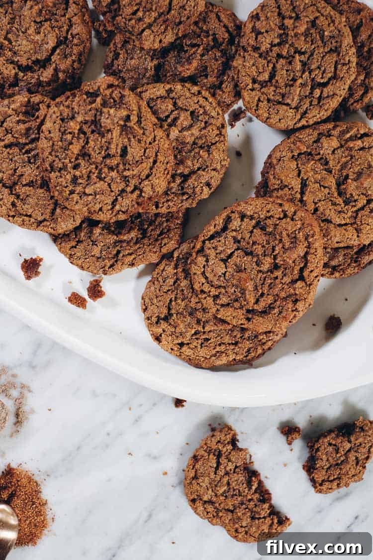 Stack of Paleo Chai Spiced Cookies, quick and easy to whip up and making any house smell cozy. Gluten-Free, Dairy-Free, Egg-Free, Refined Sugar-Free.