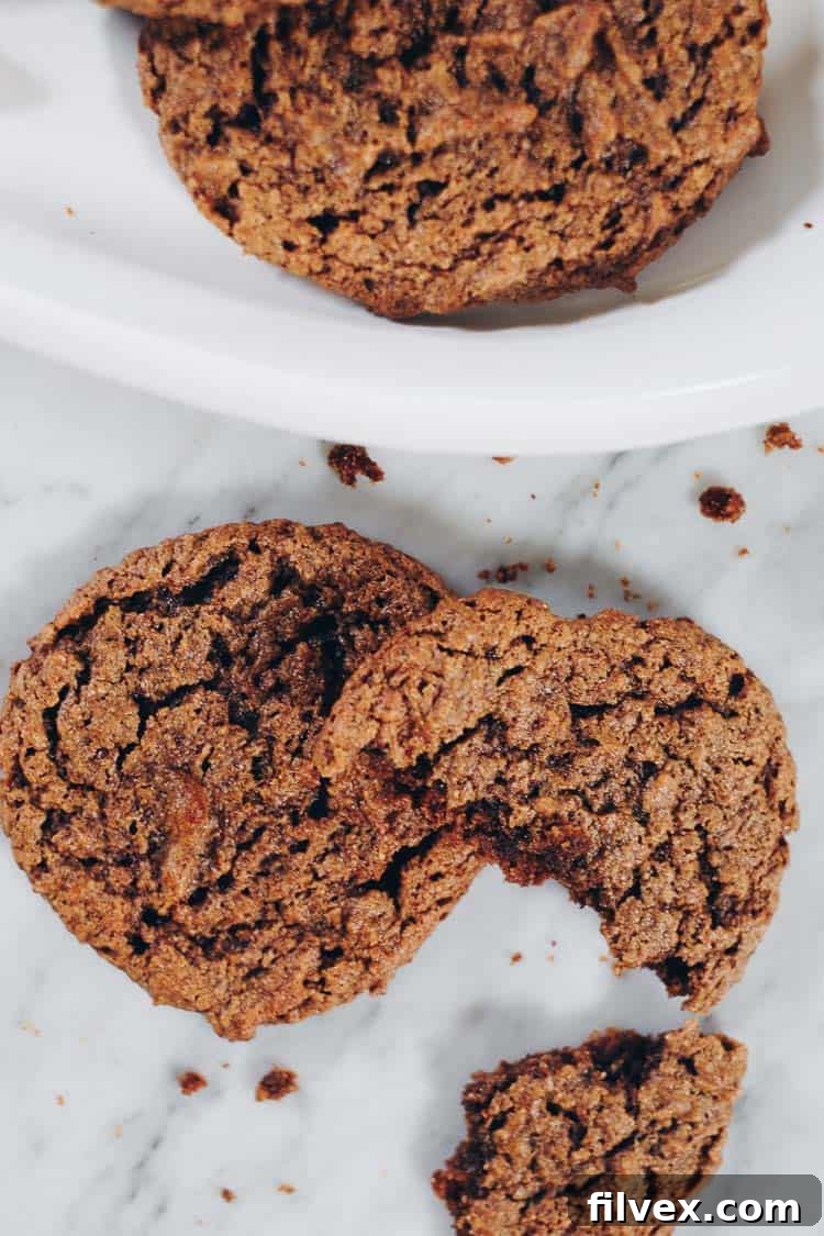 Paleo Chai Spiced Cookies cooling on a rack, quick and easy to whip up and making any house smell cozy. Gluten-Free, Dairy-Free, Egg-Free, Refined Sugar-Free.