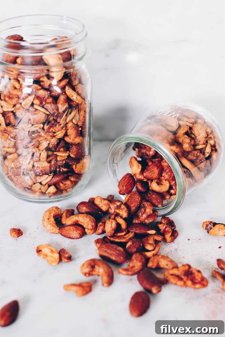 These Paleo spiced nuts are a great way to add extra flavor to your day! They are super simple and easy to make and obviously crazy addicting! Whole30 too! #paleo #whole30 #holidays #mixednuts #spicednuts | realsimplegood.com