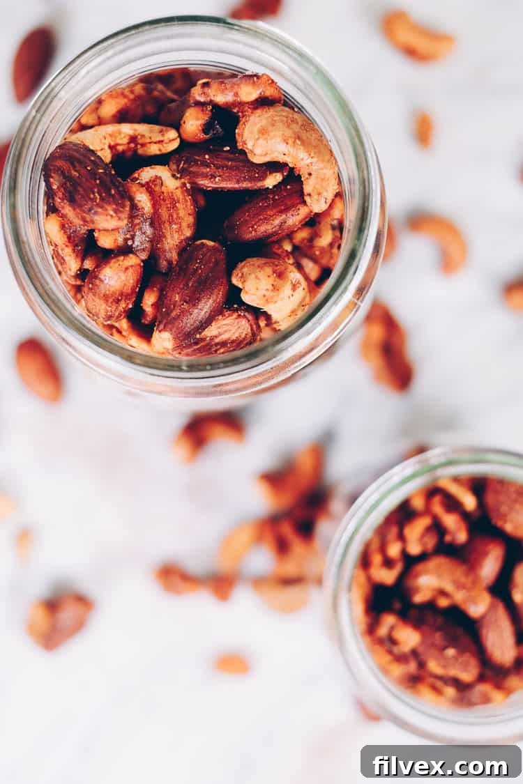 These Paleo spiced nuts are a great way to add extra flavor to your day! They are super simple and easy to make and obviously crazy addicting! Whole30 too! #paleo #whole30 #holidays #mixednuts #spicednuts | realsimplegood.com
