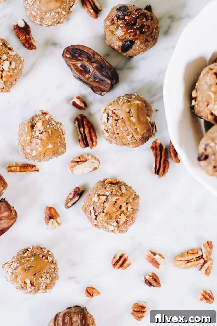Close-up of freshly made Pecan Date Energy Bites, showing their texture and natural ingredients. Perfect for a quick, healthy snack.