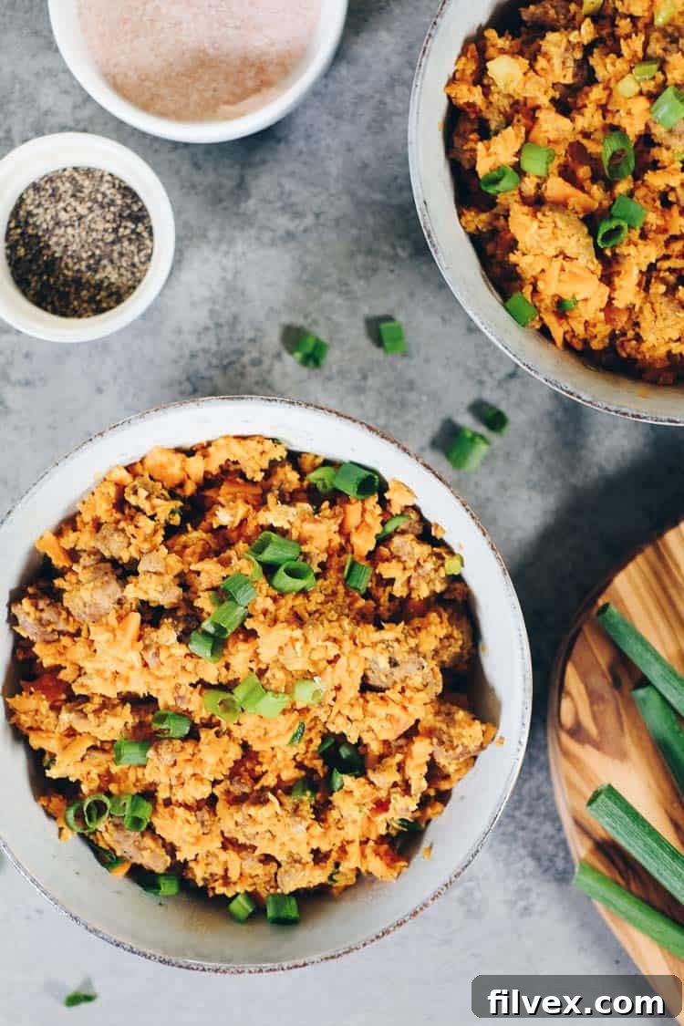 A delicious twist on pork fried rice, both Paleo and Whole30 compliant! This sweet potato pork fried rice is a unique recipe with tons of flavor. #paleo #whole30meals #recipe | realsimplegood.com