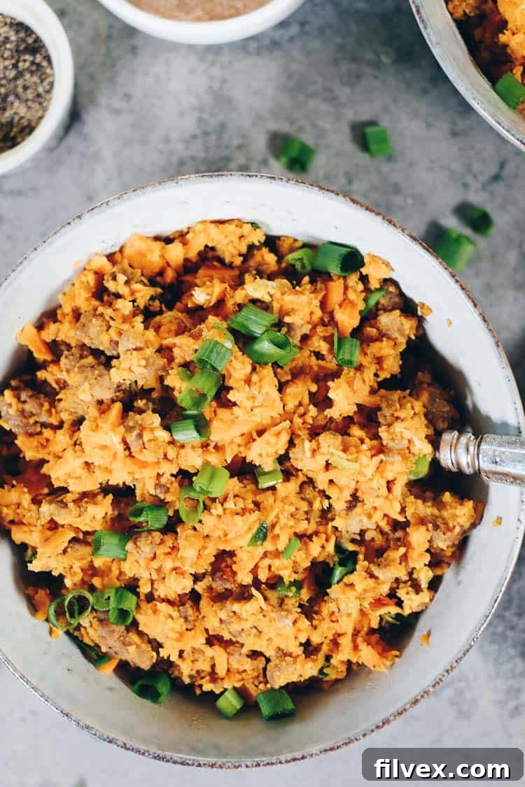 A delicious twist on pork fried rice, both Paleo and Whole30 compliant! This sweet potato pork fried rice is a unique recipe with tons of flavor. #paleo #whole30meals #recipe | realsimplegood.com