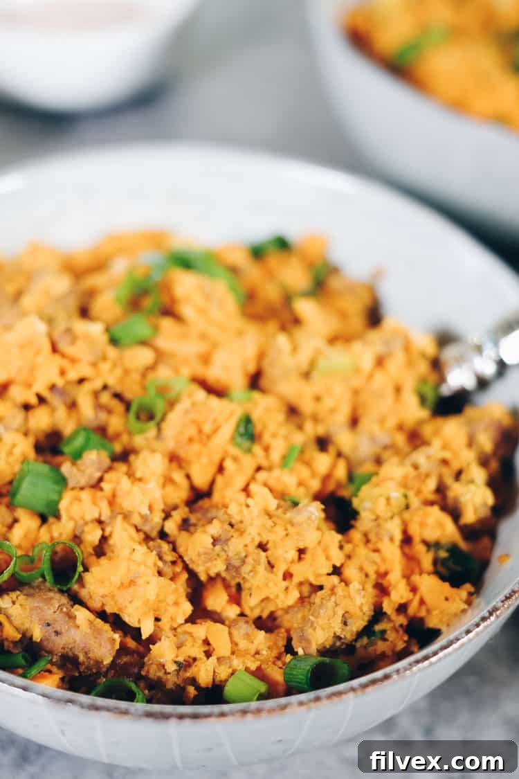 A delicious twist on pork fried rice, both Paleo and Whole30 compliant! This sweet potato pork fried rice is a unique recipe with tons of flavor. #paleo #whole30meals #recipe | realsimplegood.com