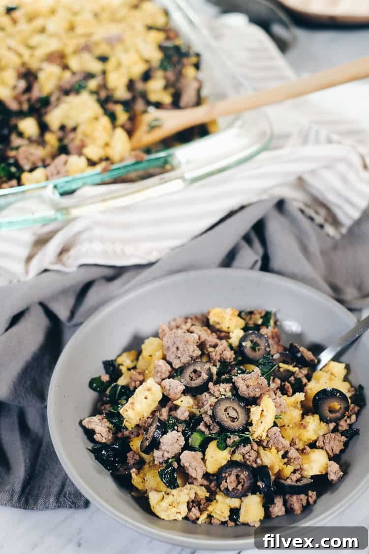 Layered with flavor: This Paleo and Whole30 Plantain Casserole features a delicious blend of mashed plantains, savory ground pork and beef, and nutrient-packed kale. Ideal for healthy weeknight dinners. #paleolife #whole30recipe #paleorecipe | realsimplegood.com