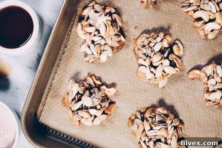 Experience the perfect harmony of salty and sweet with these refined sugar-free Paleo Maple Vanilla Clusters. A delicious and wholesome treat for any time of day. #paleo #paleotreats #refinedsugarfree #cleantreats | realsimplegood.com