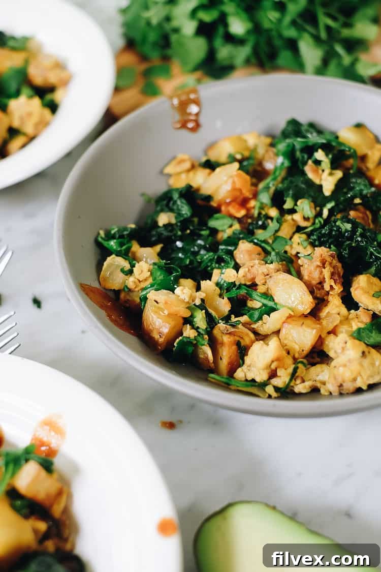 Nutritious Chorizo and Eggs meal prep portions in containers, ready for a week of healthy Paleo and Whole30 breakfasts.