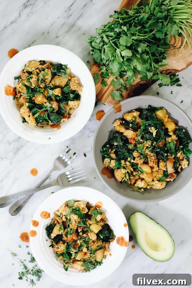 Fresh cilantro and avocado slices perfectly topping a serving of Chorizo and Eggs, a delicious and customizable breakfast.