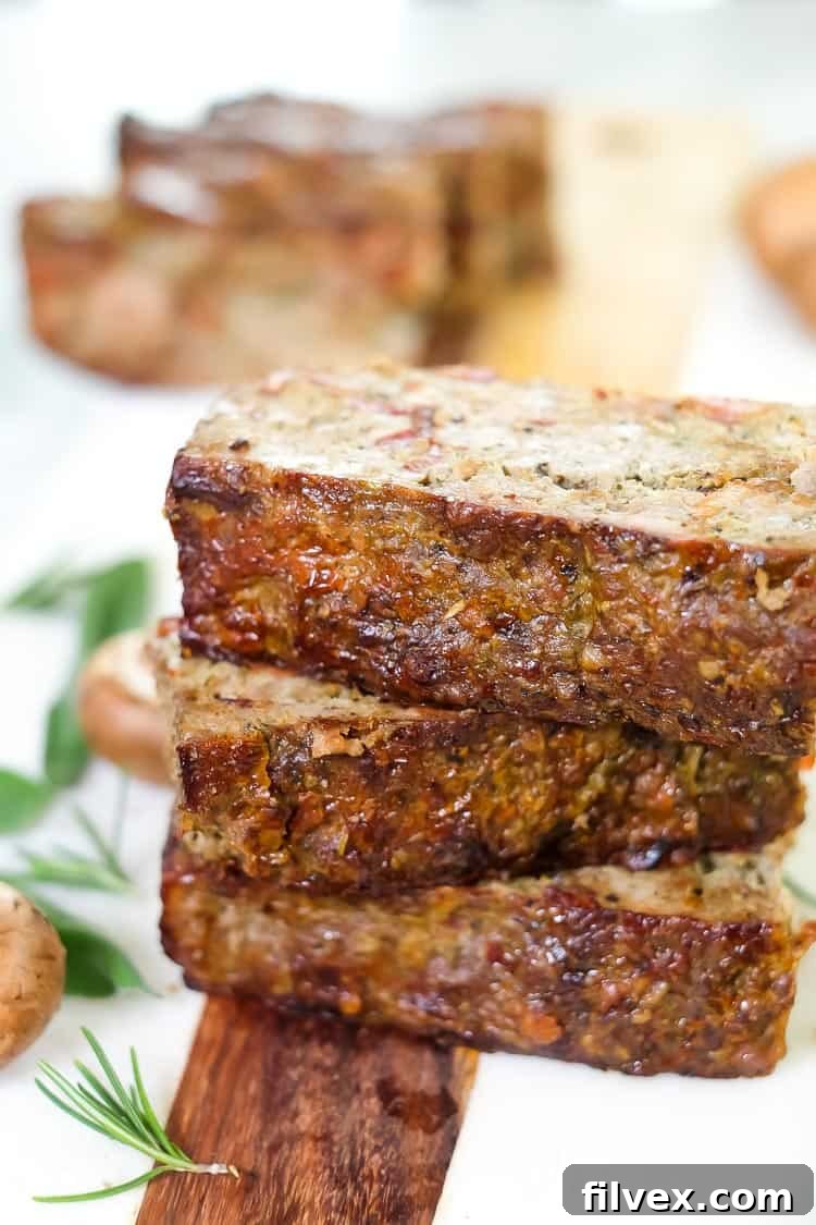 Breakfast meatloaf with bacon stack of meatloaf on board