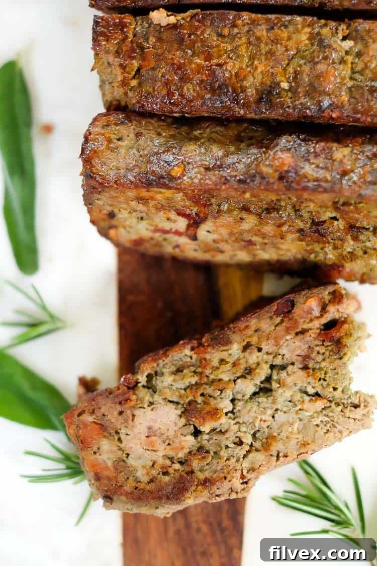 Breakfast meatloaf with bacon horizontal overhead with meatloaf pieces
