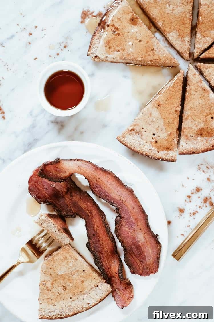 This grain-free healthy french toast recipe is so delicious, you won't believe it doesn't use bread! It's really just a french toast bake that is super easy to make and ready to eat in about 20 minutes! It's grain-free, refined sugar-free and Paleo friendly! | realsimplegood.com #paleo #paleobreakfast #grainfree