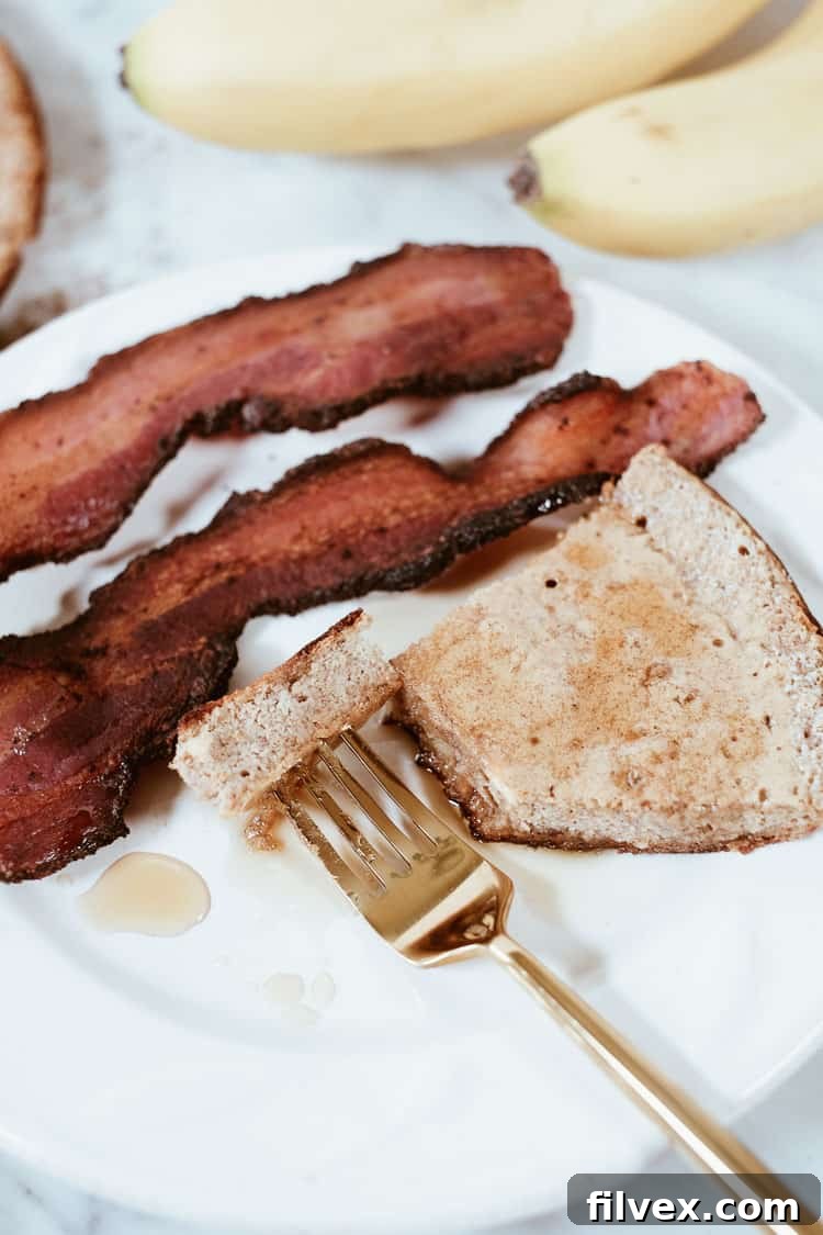 This grain-free healthy french toast recipe is so delicious, you won't believe it doesn't use bread! It's really just a french toast bake that is super easy to make and ready to eat in about 20 minutes! It's grain-free, refined sugar-free and Paleo friendly! | realsimplegood.com #paleo #paleobreakfast #grainfree