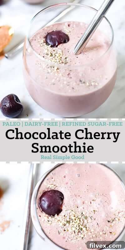 Tall pin image of a chocolate cherry smoothie in glasses, garnished with hemp seeds and cherries, highlighting its delicious appeal.