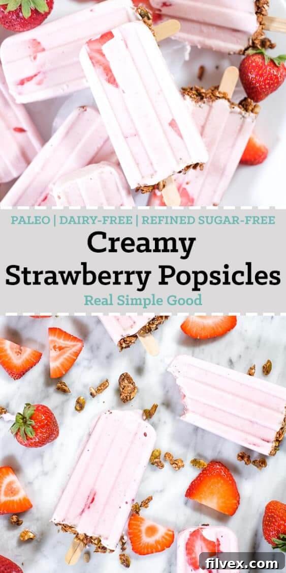 Creamy strawberry popsicles with granola on the bottom and fresh strawberries long pin