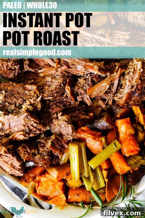 Instant Pot pot roast on a serving platter with sweet potato, carrots, onion, celery and fresh herbs long pin. 