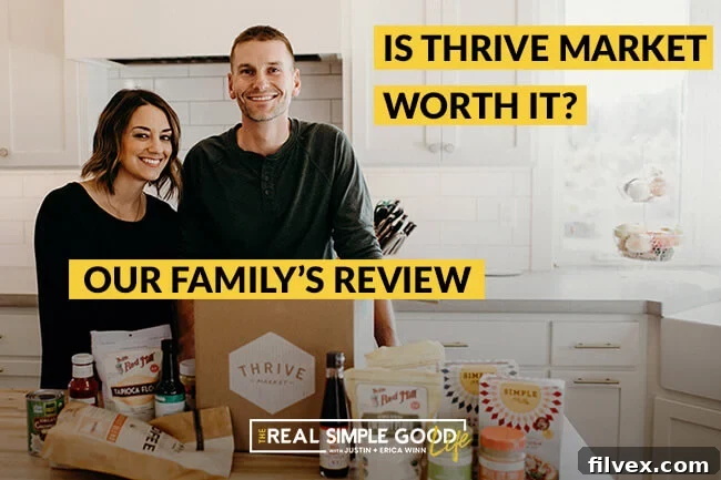 Justin and Erica Winn in the kitchen with Thrive market box and food products on the counter, symbolizing healthy grocery shopping.