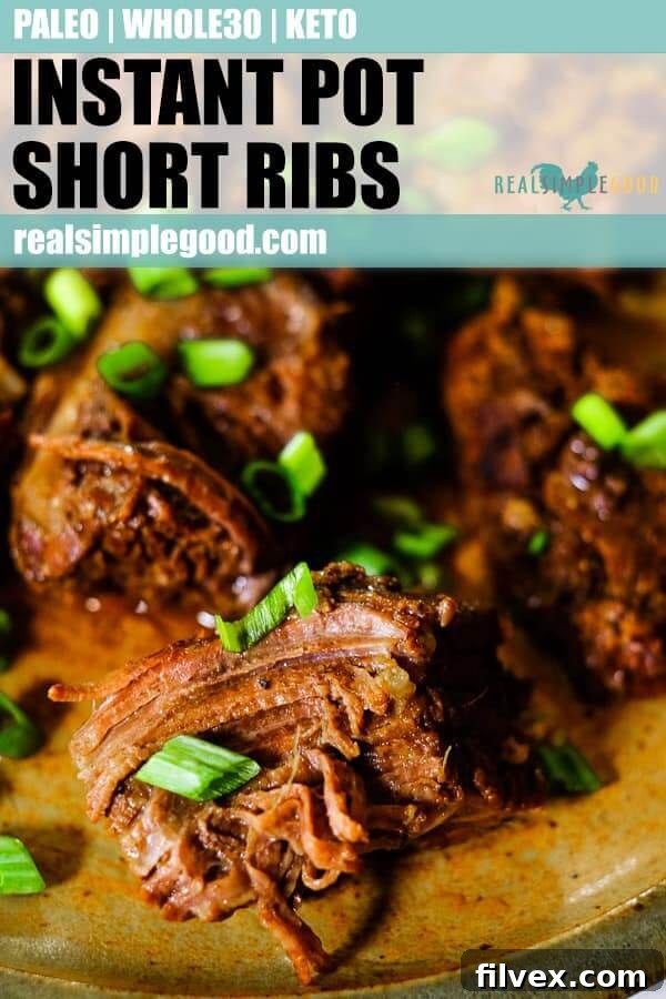 Instant pot short ribs on a plate garnished with chopped green onion. Long pin for pinterest.